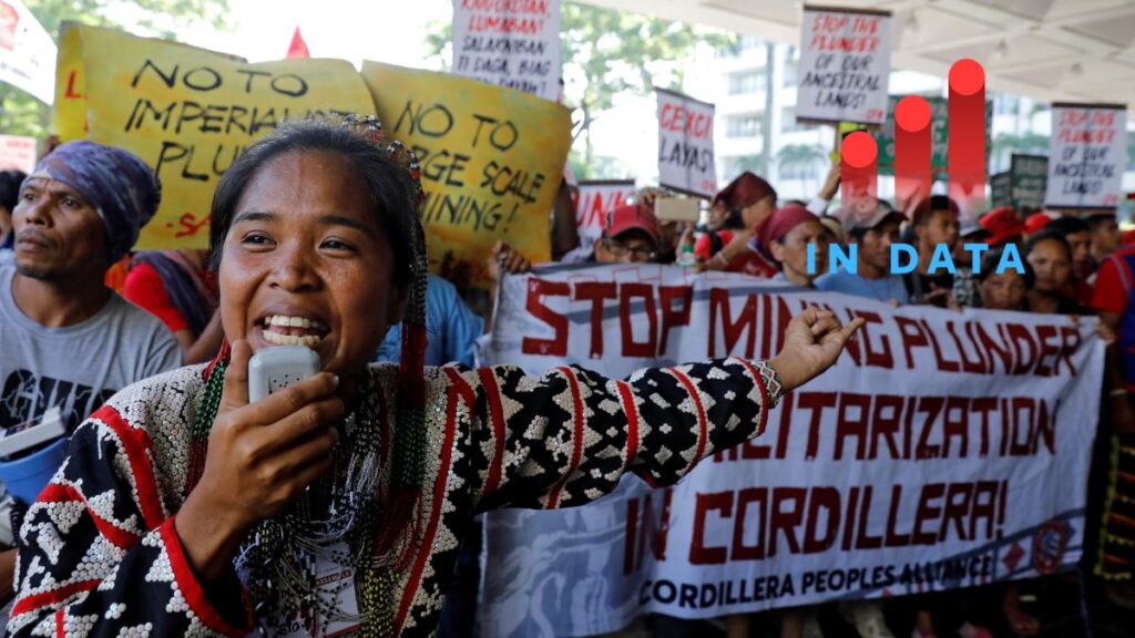 An anti-mining protester speaks during a rally outside a hotel where the Philippines annual mining conference is held in Pasay, Metro Manila, Philippines, September 6, 2017. REUTERS/Erik De Castro